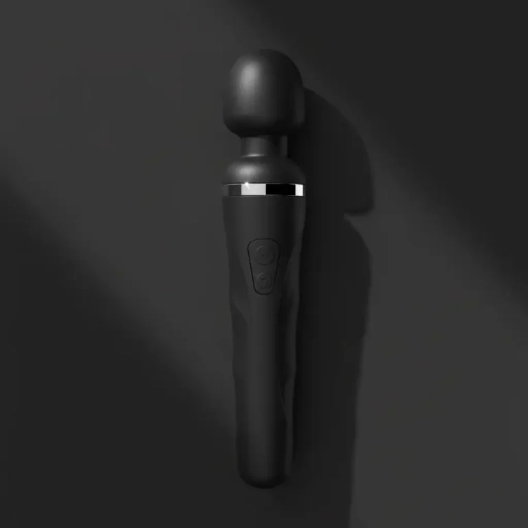 Lovense Domi 2 wand vibrator on a dark surface