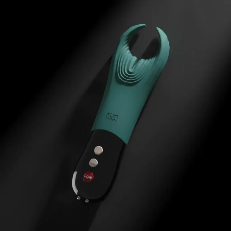 Fun Factory Manta in teal on a dark background
